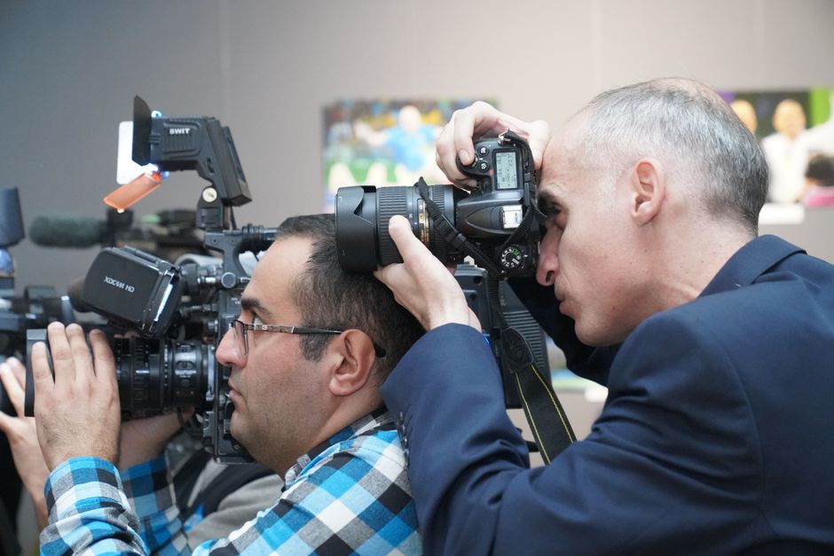 Photo and video from one team versus two separate hires